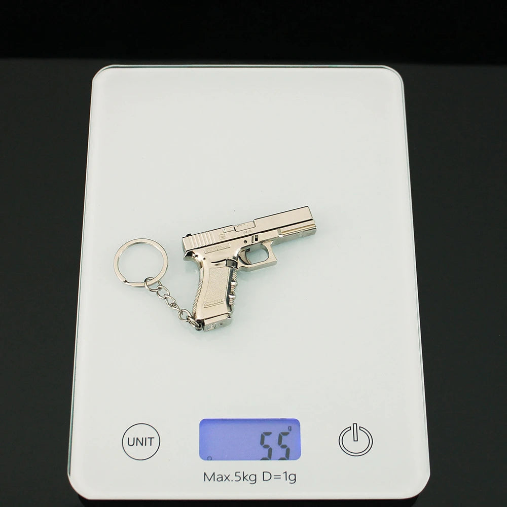 Delta Force Glock G17 Pistol Keychain – 6.5cm Mini Metal Toy Gun Model & Game Pendant for Fans and Collectors
